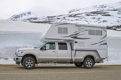 the ram 1500 can hold a truck camper that is compatible with your truck